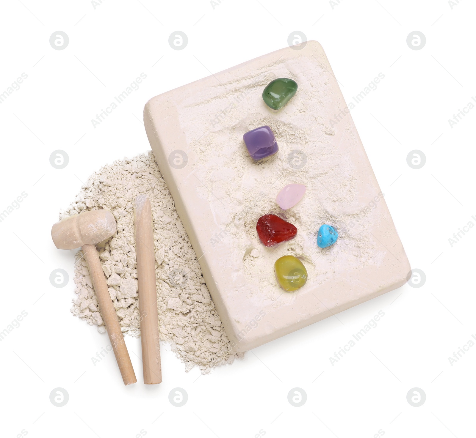 Photo of Excavation kit on white background, top view. Educational toy for motor skills