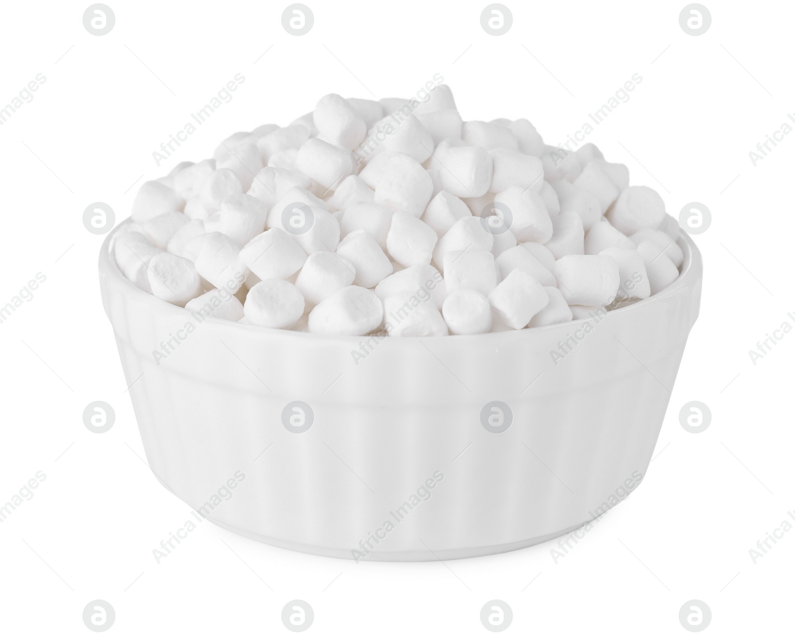 Photo of Bowl of delicious puffy marshmallows isolated on white