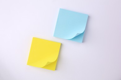 Blank paper notes on white background, flat lay