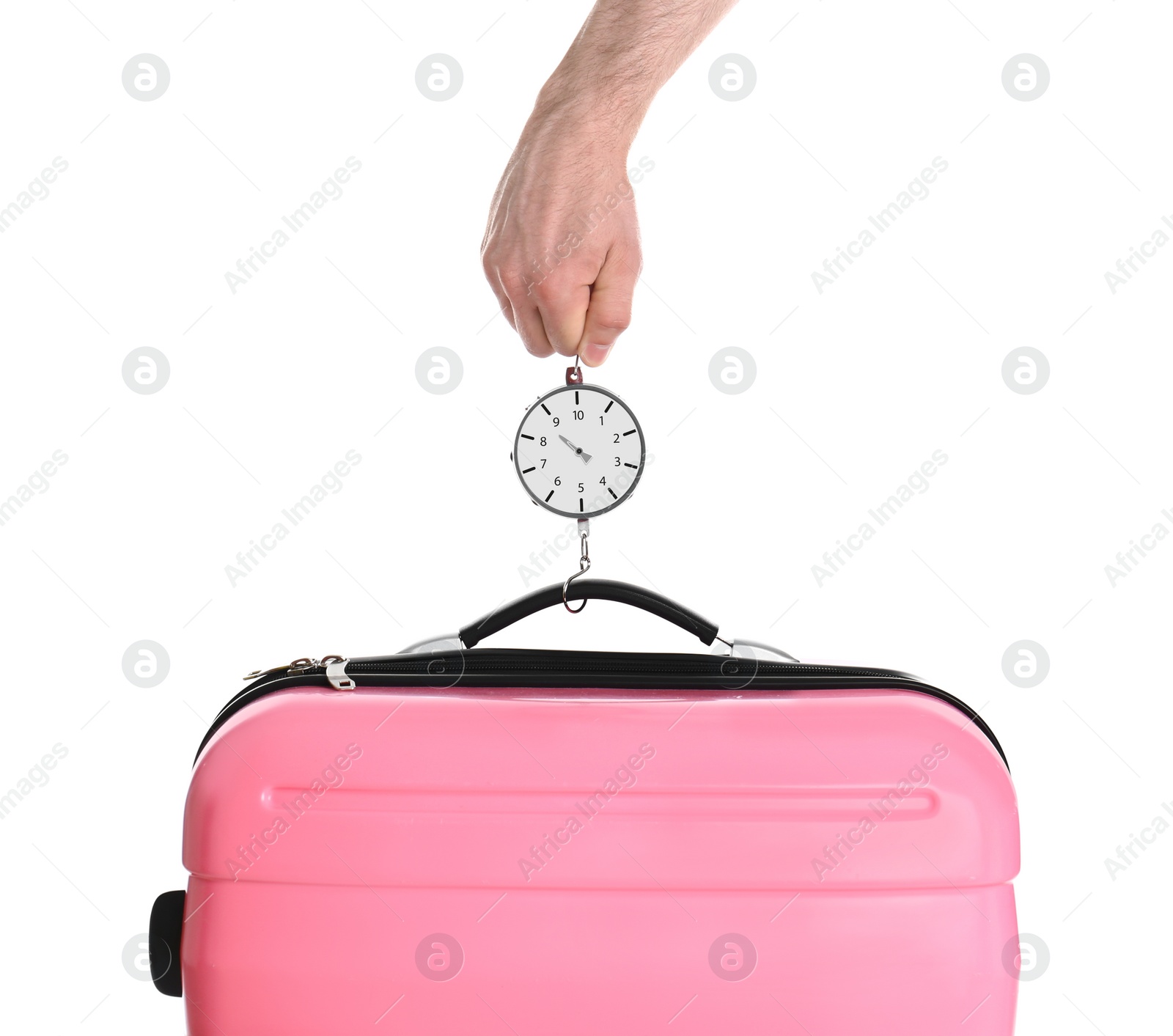 Photo of Man weighing stylish suitcase against white background, closeup