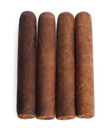 Cigars wrapped in tobacco leaves isolated on white, top view