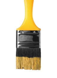 Brush with yellow paint on white background