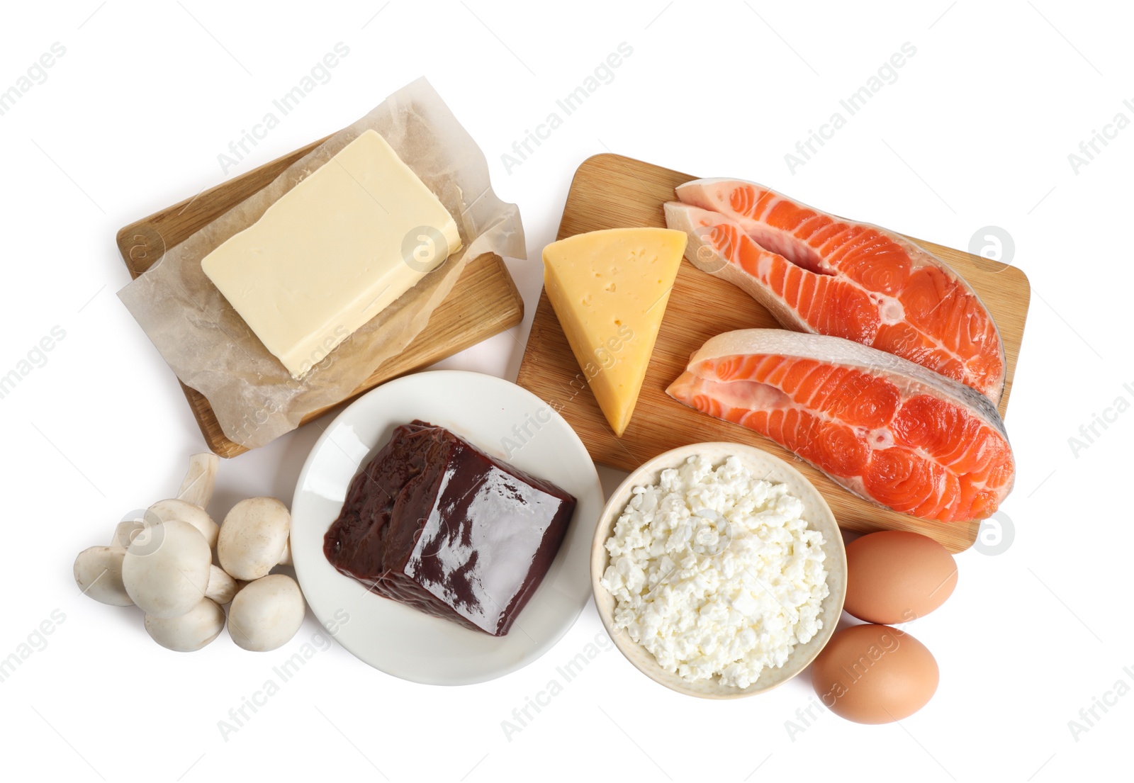 Photo of Fresh products rich in vitamin D on white background, top view