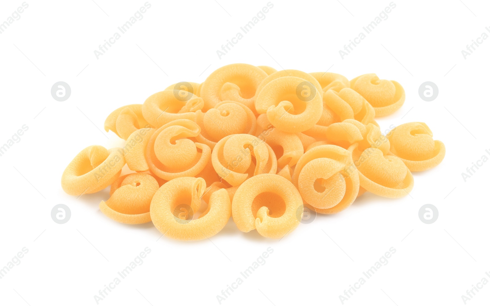 Photo of Pile of raw dischi volanti pasta isolated on white