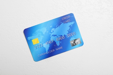 Photo of Credit card on white table, top view