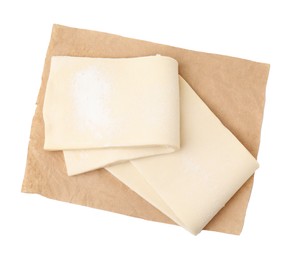 Photo of Raw puff pastry dough isolated on white, top view