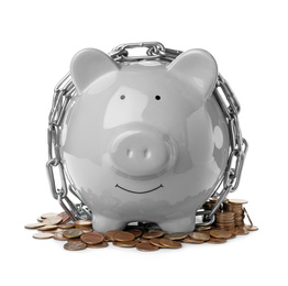 Photo of Piggy bank with steel chain and coins isolated on white. Money safety concept