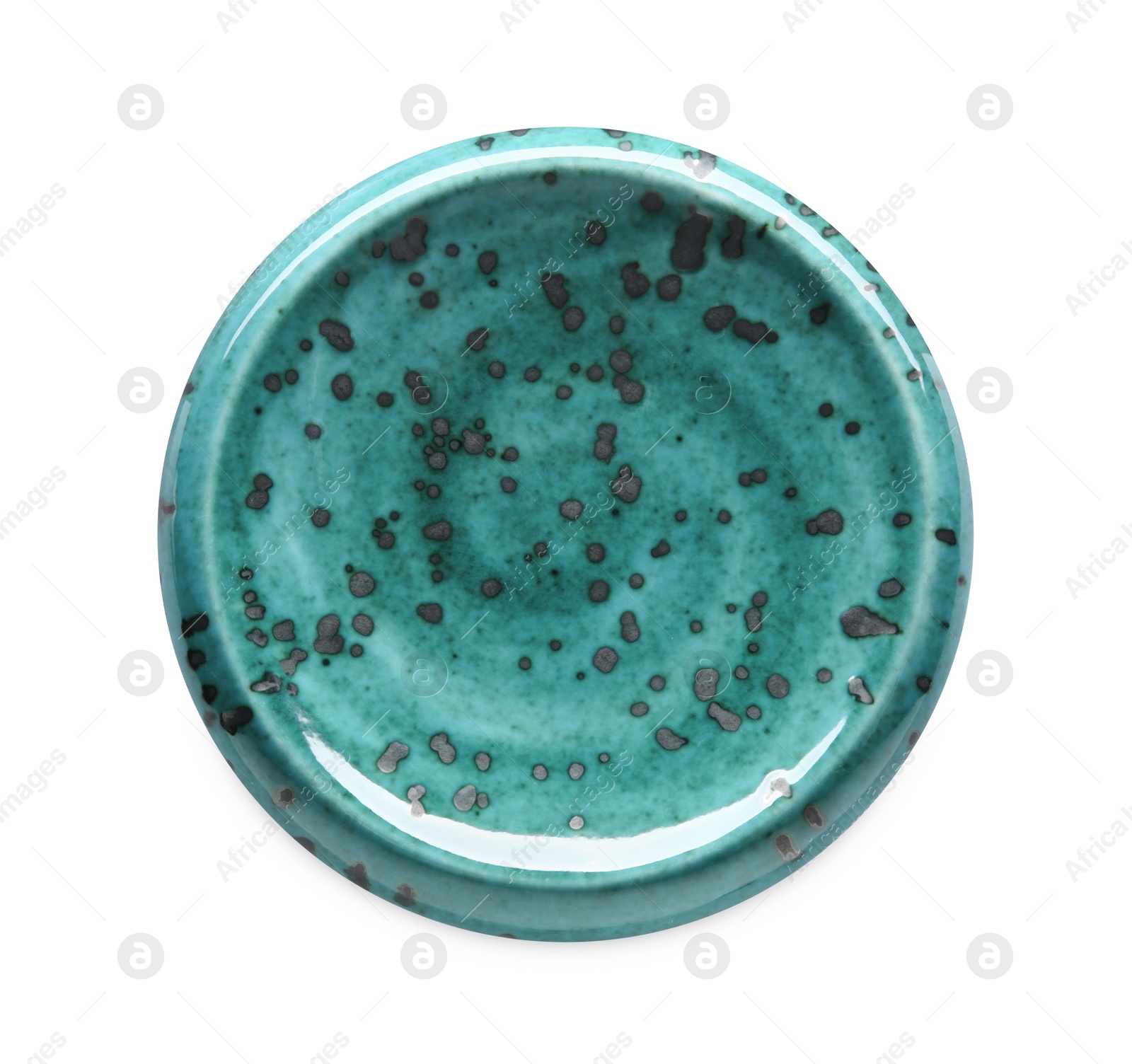 Photo of Turquoise ceramic plate isolated on white, top view