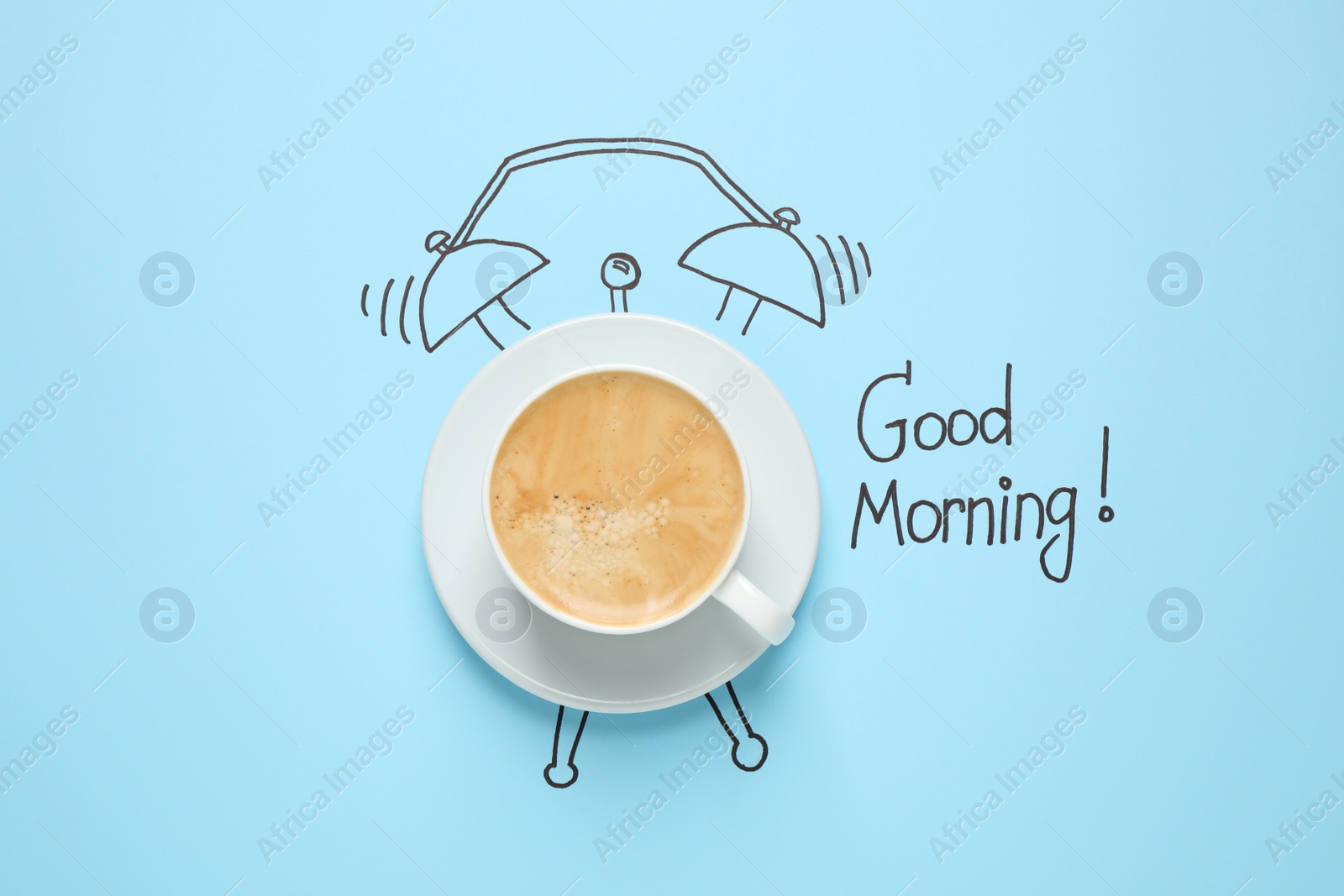 Photo of Composition with Good Morning wish and aromatic coffee on light blue background, top view