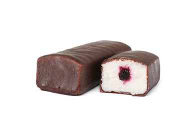 Photo of Cut and whole glazed curds with berry filling isolated on white