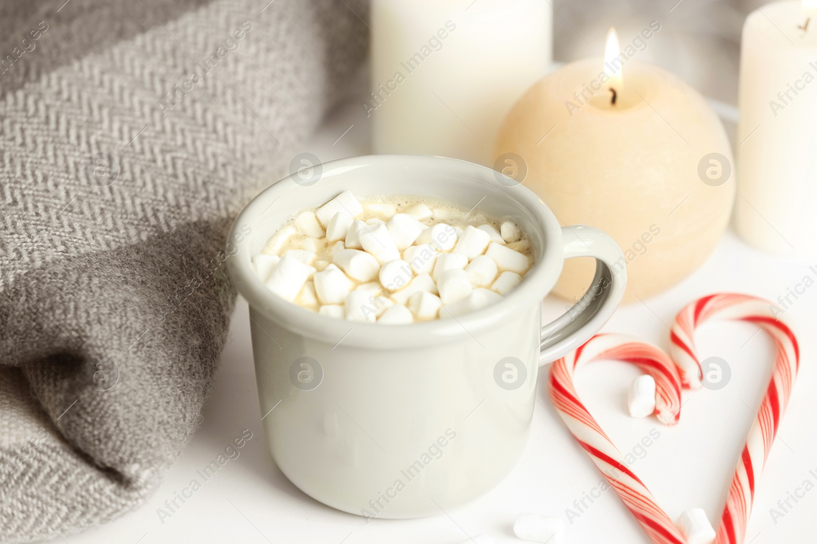 Photo of Composition with cup of hot winter drink on table. Cozy season