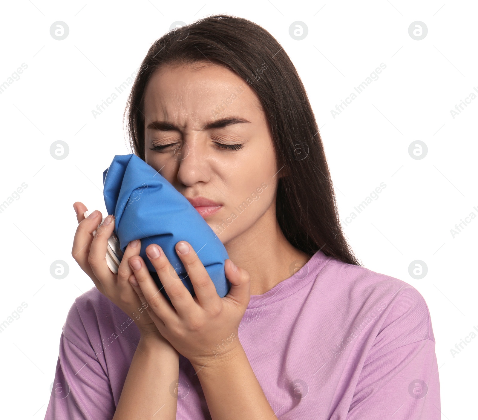 Photo of Young woman suffering from toothache on white background