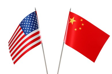 Photo of USA and China flags on white background. International relations