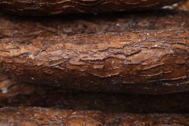 Photo of Fresh cassava roots as background, top view