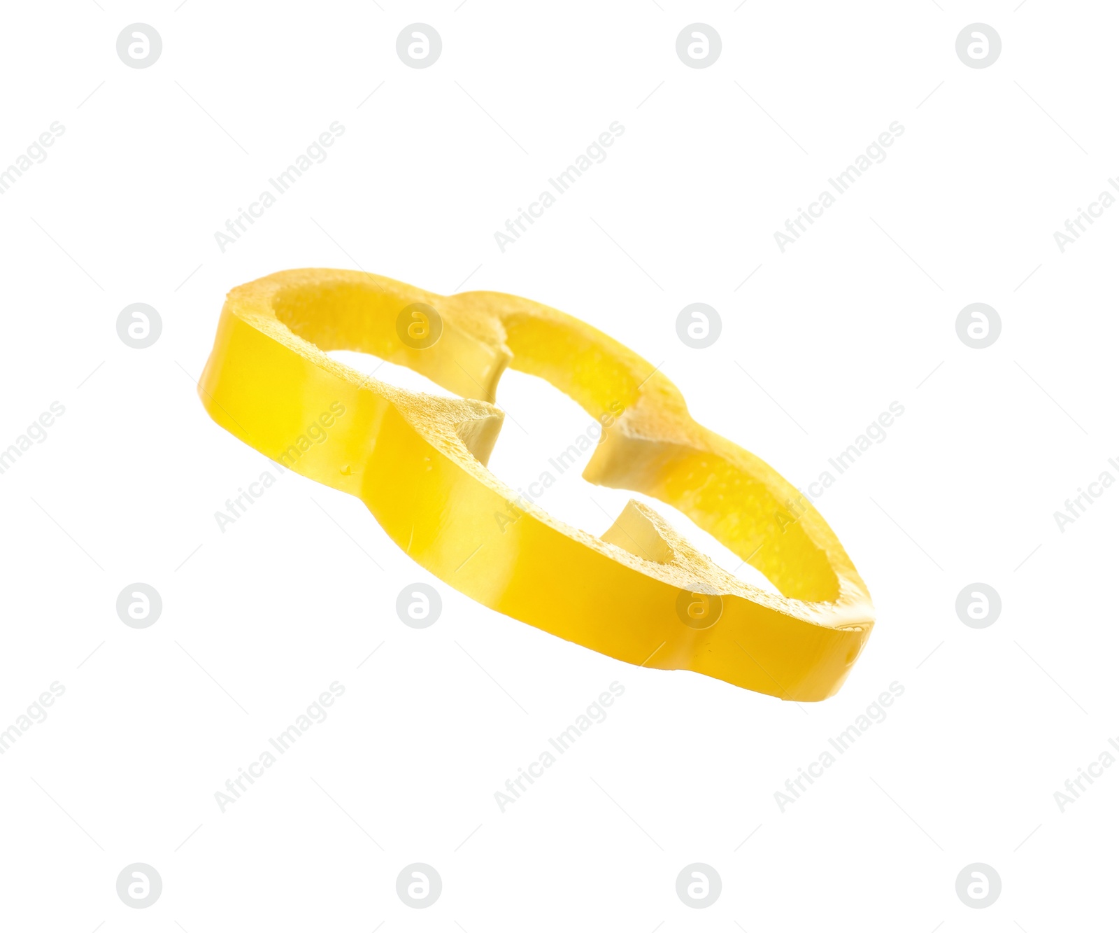 Photo of Slice of ripe yellow bell pepper isolated on white