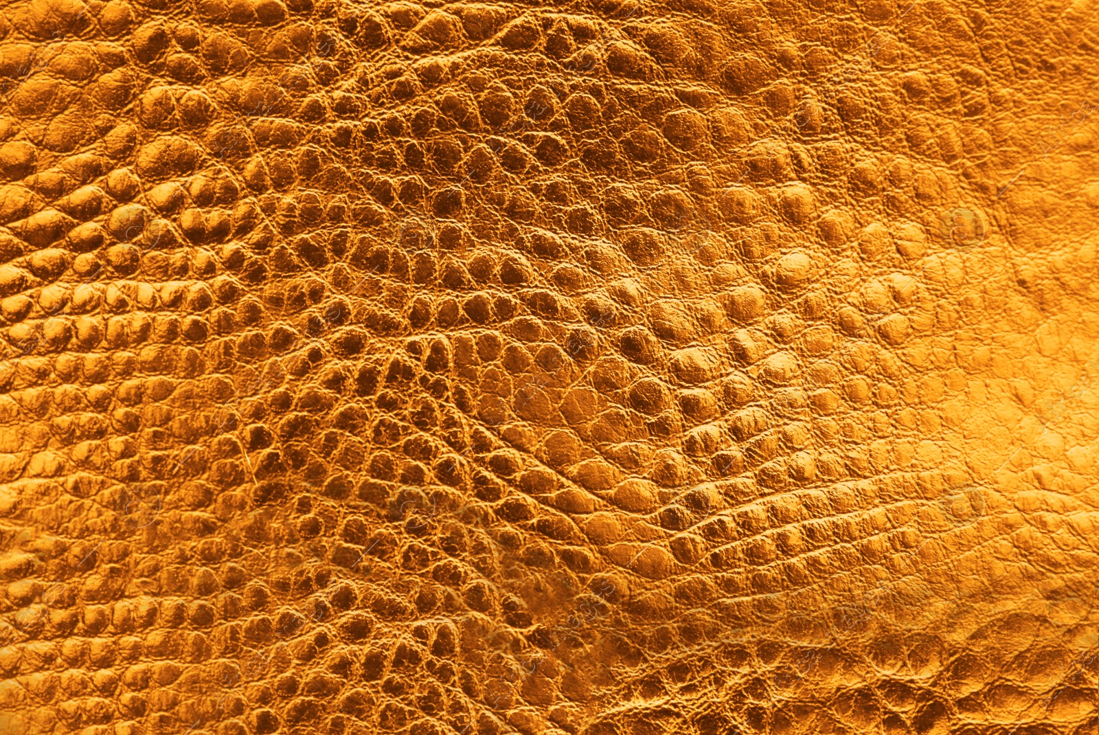 Image of Texture of orange leather as background, closeup