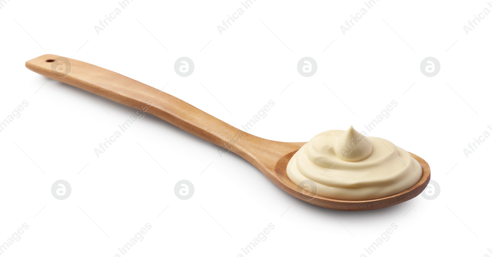 Photo of Natural yogurt in wooden spoon isolated on white