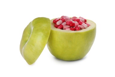 Photo of Apple full of weight loss pills on white background