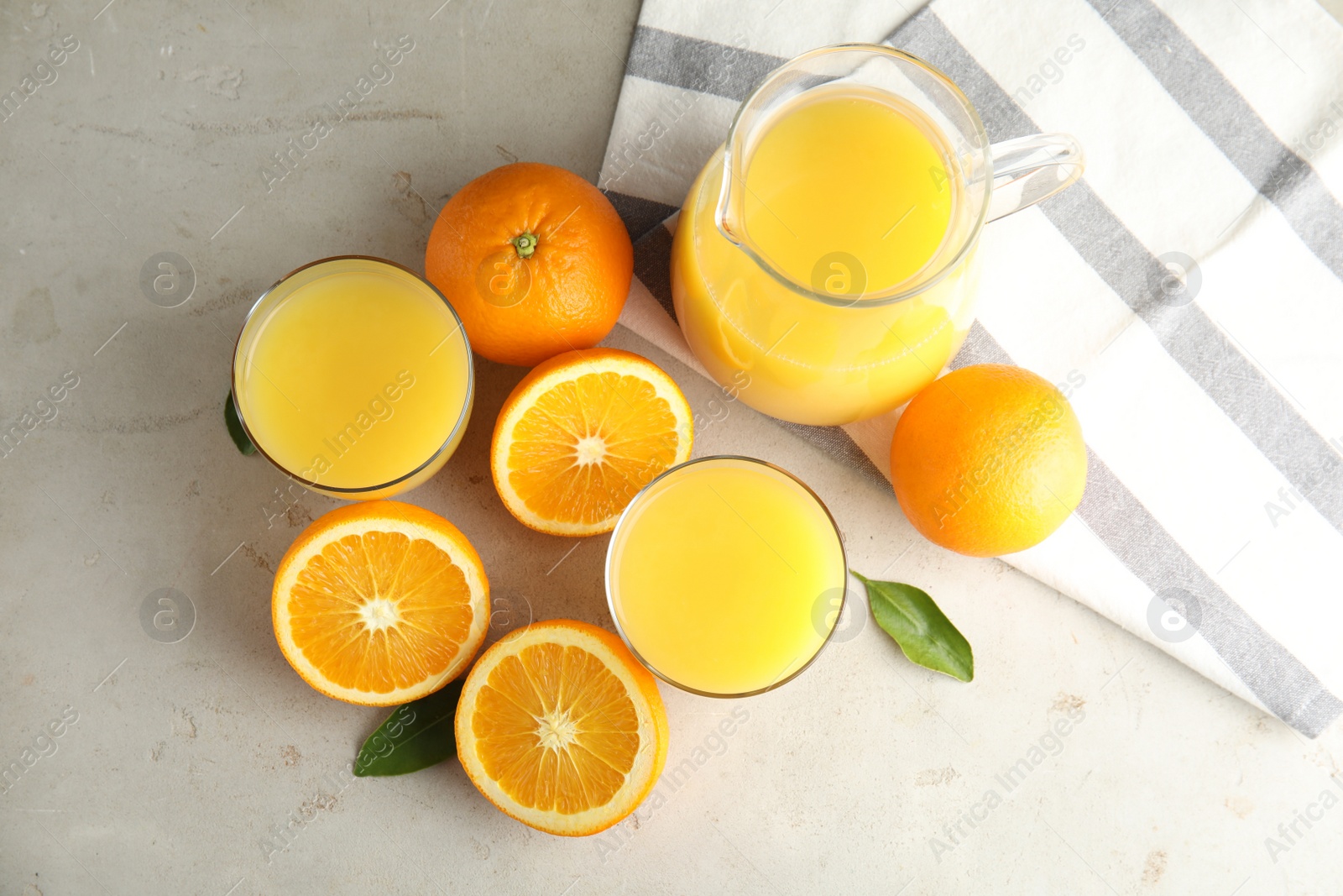 Photo of Flat lay composition with orange juice and fresh fruit on light background