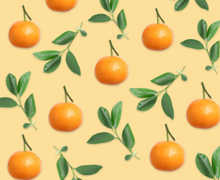 Image of Pattern of tangerines and leaves on pale orange background