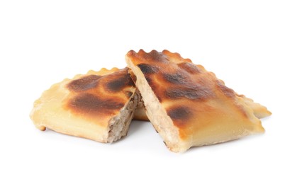 Photo of Cut fried cheburek isolated on white. Traditional pastry
