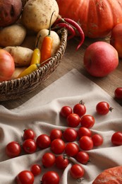 Different fresh ripe vegetables, berries and fruits on wooden table. Farmer produce