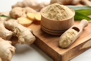 Photo of Dry and fresh ginger on white table