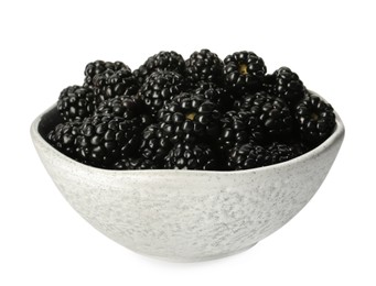 Photo of Bowl with fresh ripe blackberries isolated on white