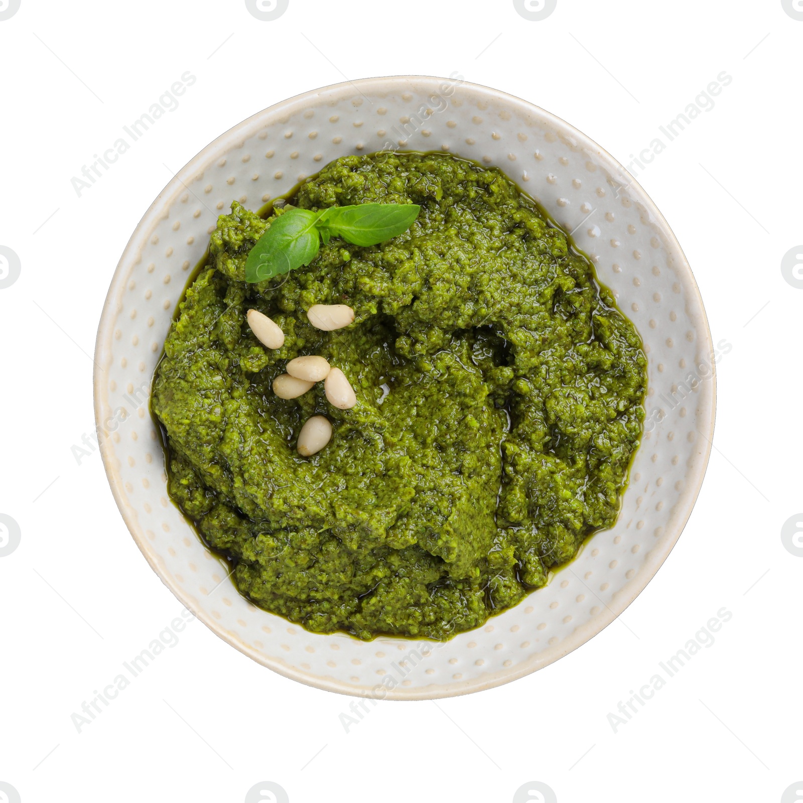 Photo of Fresh tasty pesto sauce isolated on white, top view