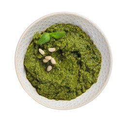 Photo of Fresh tasty pesto sauce isolated on white, top view