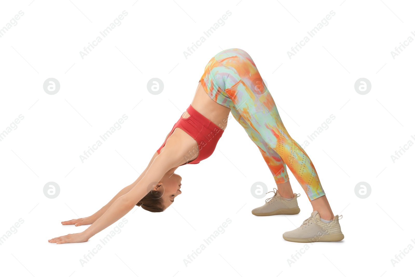 Photo of Young woman practicing yoga on white background