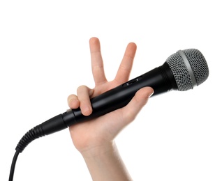 Photo of Child holding microphone on white background, closeup of hand