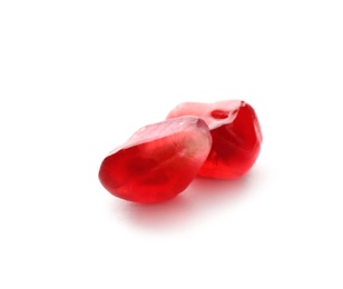 Photo of Pomegranate seeds on white background. Delicious fruit