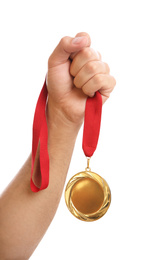 Photo of Man holding golden medal on white background, closeup. Space for design