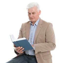 Senior man reading book on white background