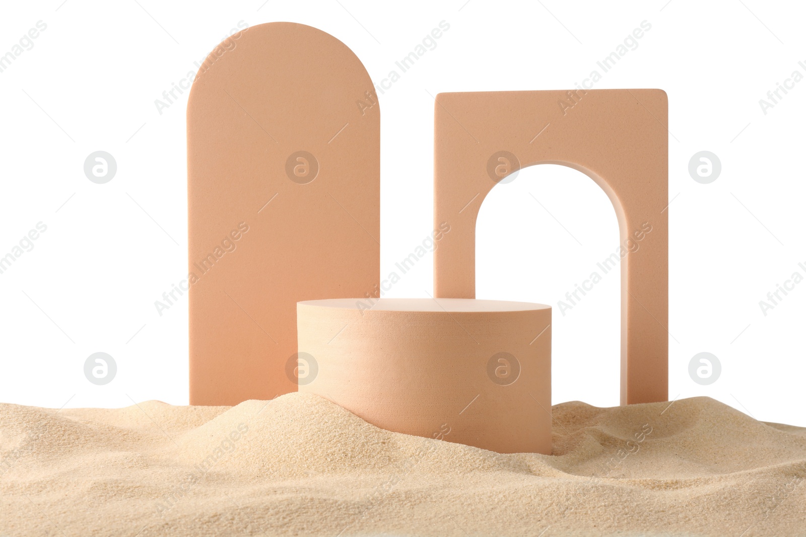 Photo of Presentation of product. Different podiums on sand against white background