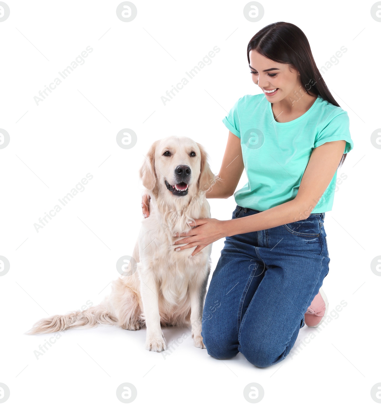 Photo of Young woman and her Golden Retriever dog on white background