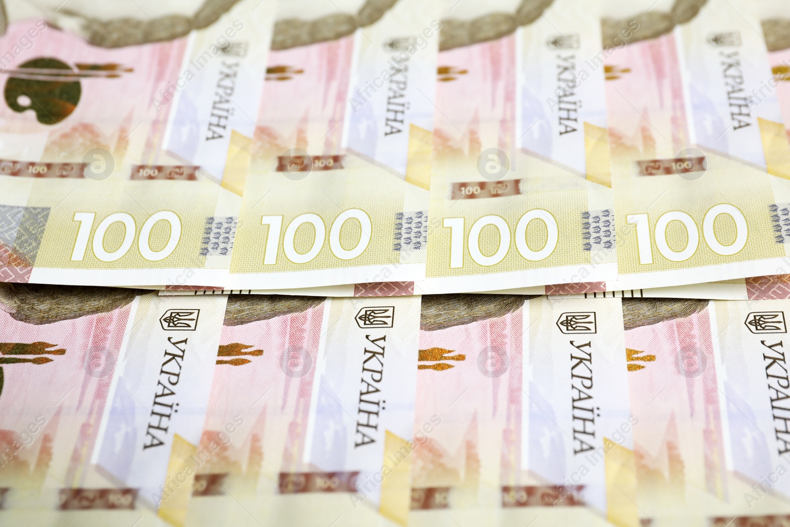 Photo of Closeup view of Ukrainian money as background. National currency