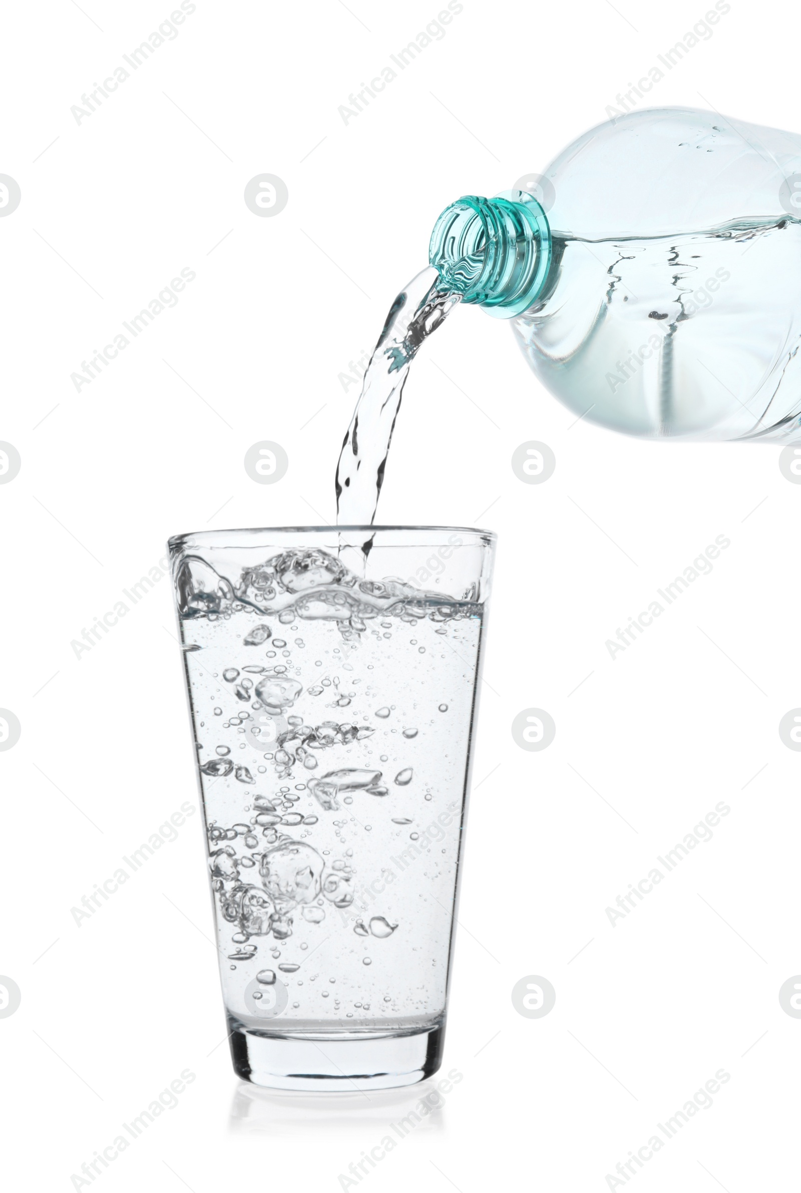 Photo of Pouring soda water from bottle into glass on white background