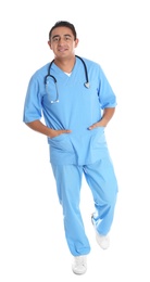 Photo of Full length portrait of male Hispanic doctor isolated on white. Medical staff