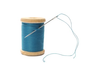 Light blue sewing thread with needle on white background