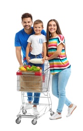 Photo of Happy family with shopping cart on white background