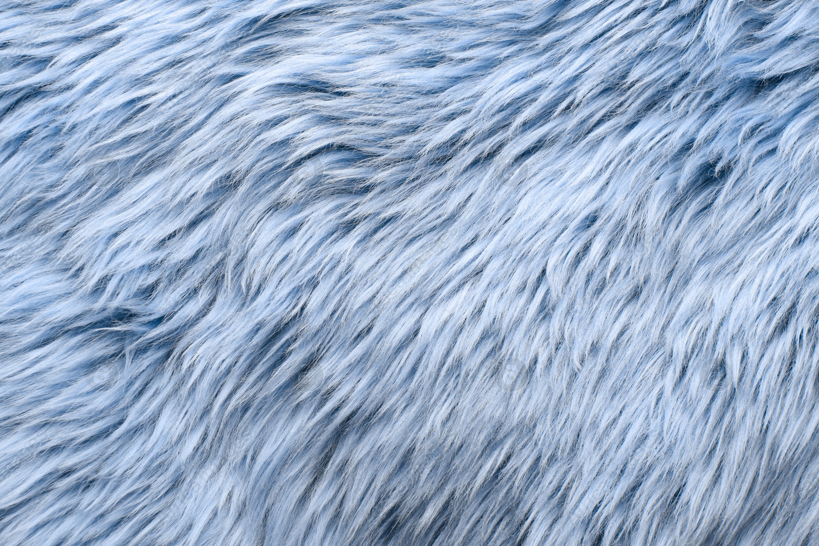 Image of Texture of light blue faux fur as background, closeup