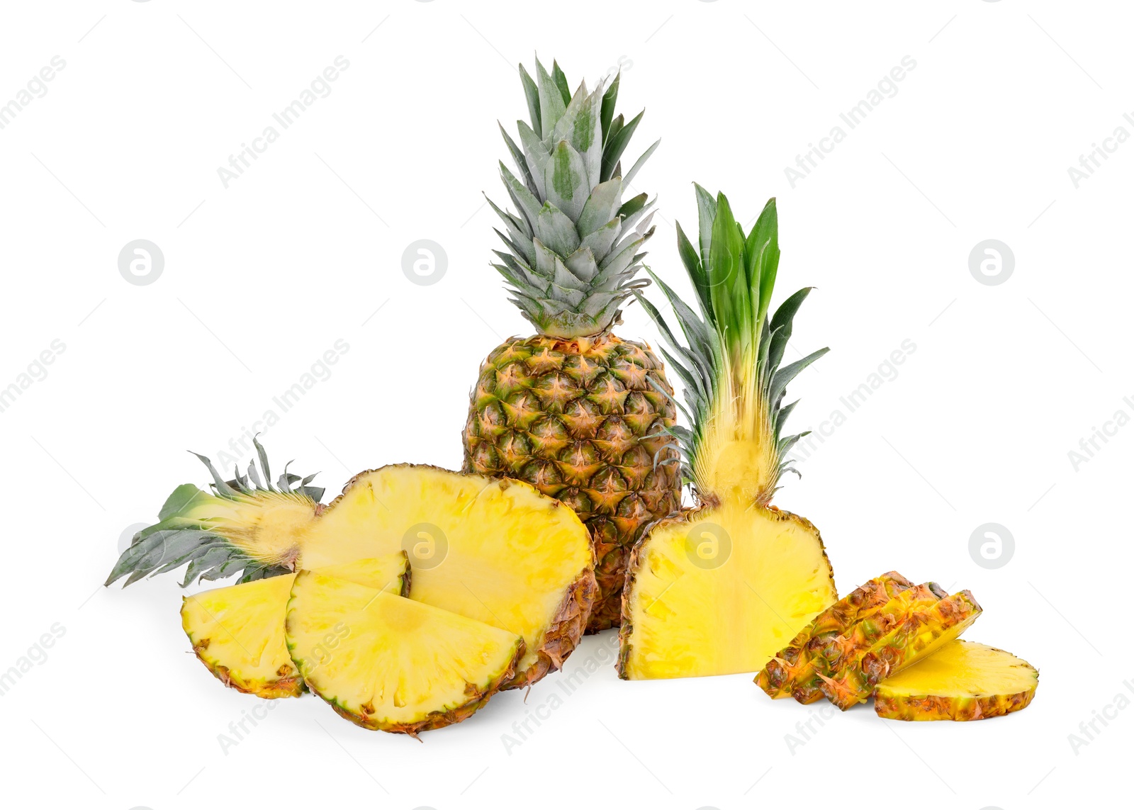 Image of Cut and whole pineapples isolated on white