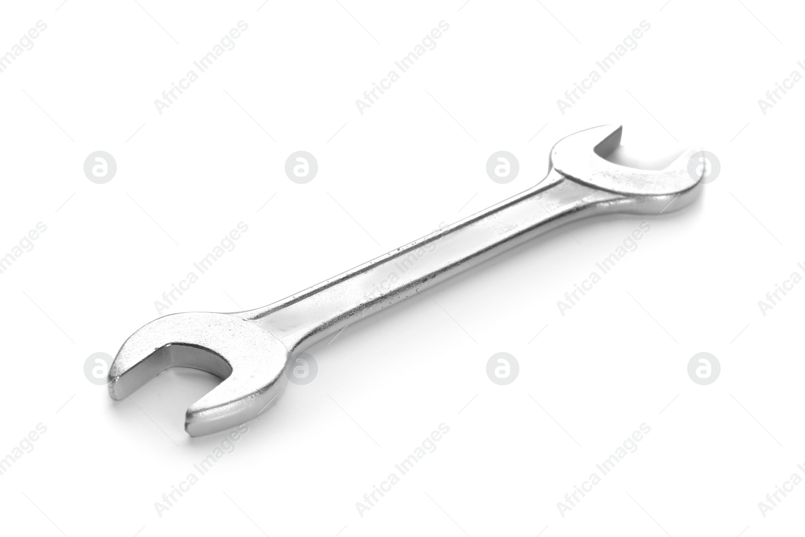 Photo of New wrench on white background. Plumber's tool