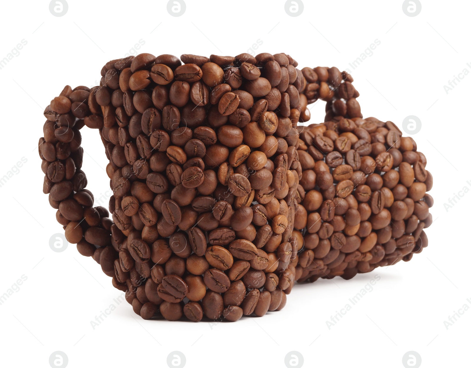 Photo of Cups of drink, composition made with coffee beans isolated on white