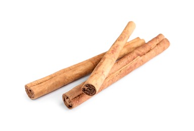 Photo of Three aromatic cinnamon sticks isolated on white