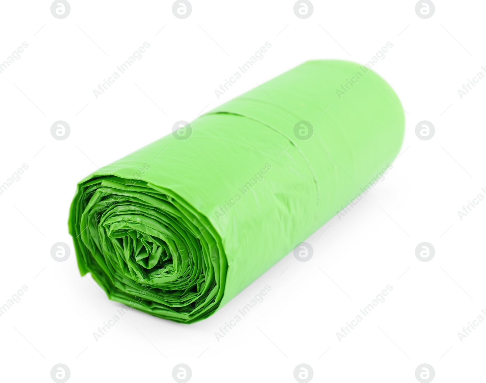 Photo of Roll of light green garbage bags isolated on white