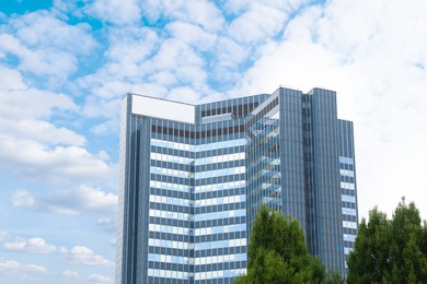 View of beautiful building and green trees outdoors