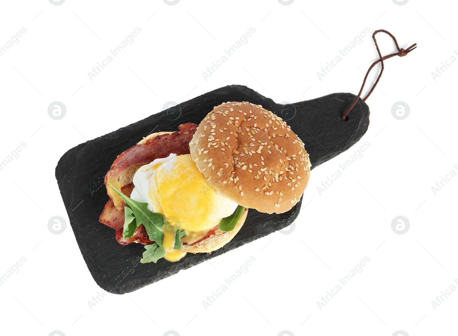 Photo of Fresh delicious egg Benedict isolated on white, top view